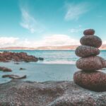 stacked stones by the seaside