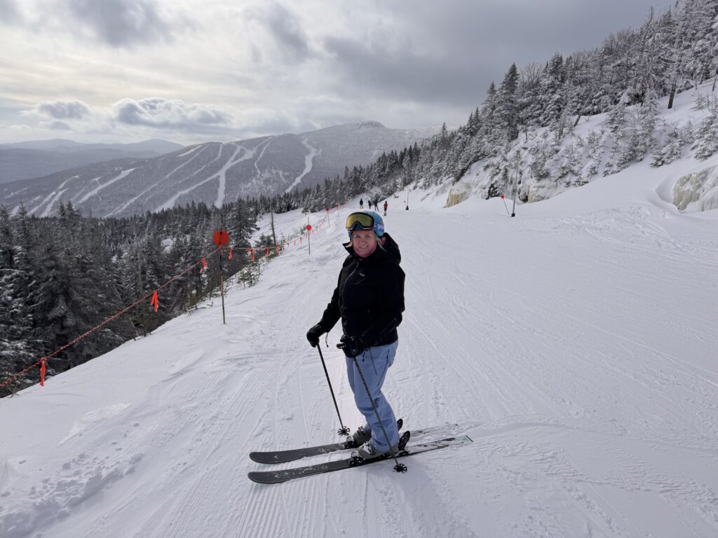 Tessa Basco skiing on a mountain, psychotherapist, mental health advocate, psychotherapy, talk therapy, Jones-Wood Psychological Associates, Ohio, LISW