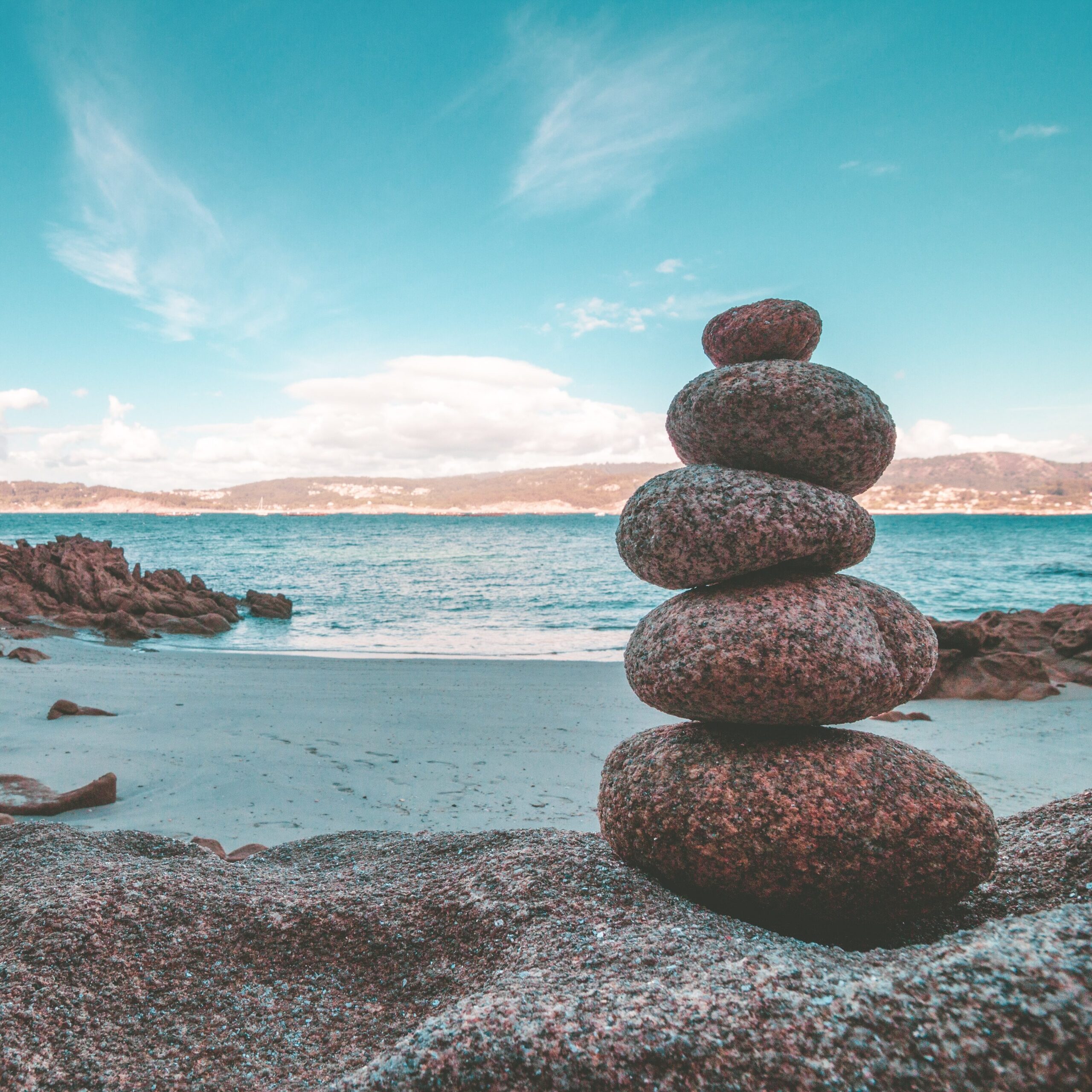 stacked stones by the seaside
